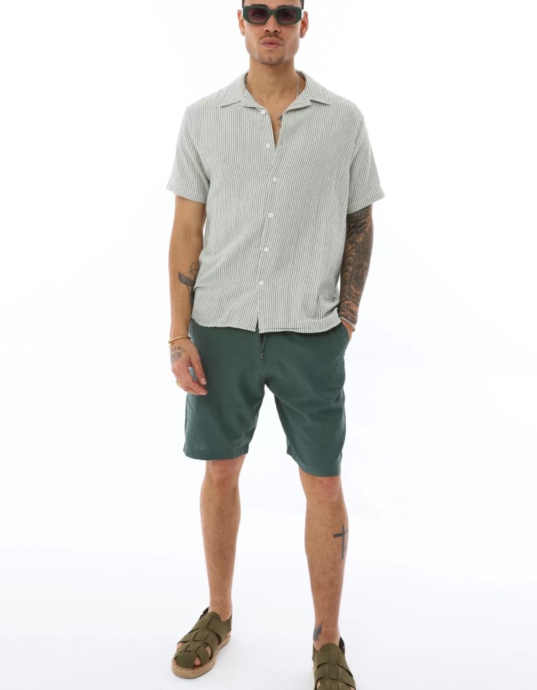 OVERSIZE İNCE ÇİZGİLİ GÖMLEK OVERSIZE İNCE ÇİZGİLİ GÖMLEK